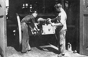 Cpl Chenoweth and Sgt Reynolds repairing a QF18 PR Mk11
