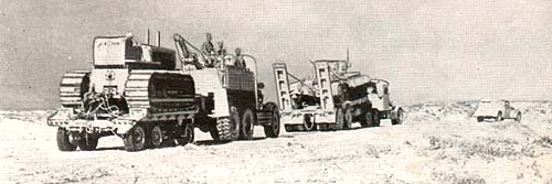 Vehicles and casualty move off